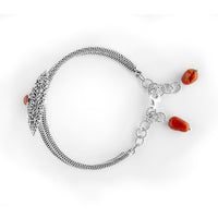Bracciale con medaglione in filigrana e coralli